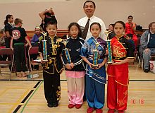 Master Leung taking pictures with some of the young winning competitors at 2014 Canadian Kung Fu Championship
